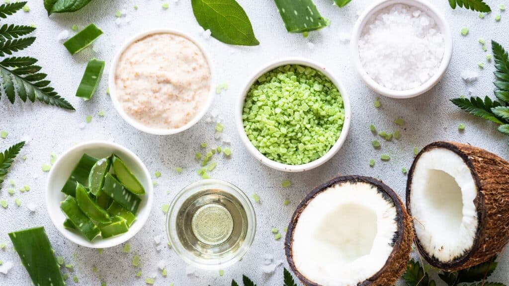 Natural spa ingredients, aloe vera, and coconut flat lay.